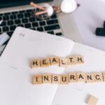 group health insurance vs individual UK